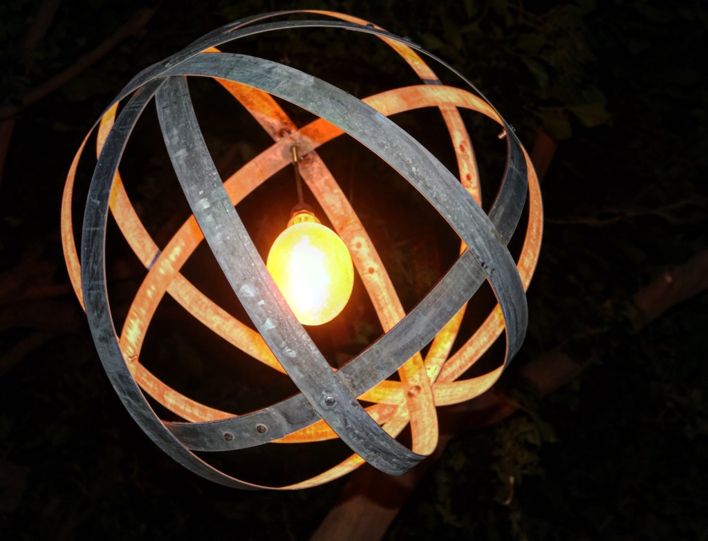 Lamp made from discarded Wine Barrel Rings. 